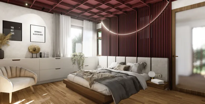 Moderní ložnice s tmavě červenými stěnami a bílým nábytkem.